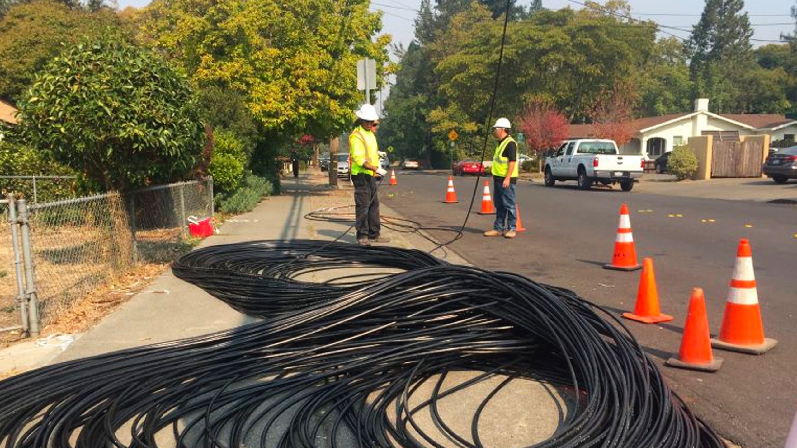 Sonic installers on the street with fiber cables