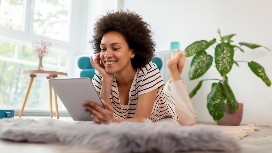 Woman surfing the web with Sonic Internet on digital tablet
